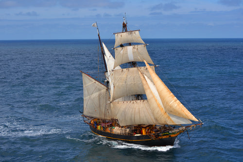 Sailing cargo ship the Tres Hombres in the middle of the ocean